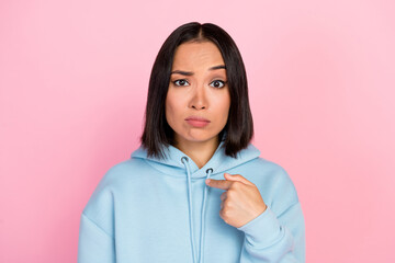 Photo portrait of pretty young girl point herself skeptical raise brow wear trendy blue garment...