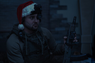 Christmas scene, a military man in a gnome hat and with a night vision device in a dark room.
