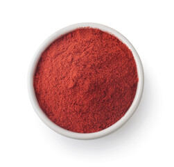 Top view of paprika powder in ceramic bowl
