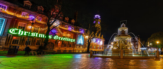 View of Leicester town hall square in the night decorated for Christmas time