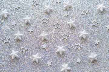 Gray glitter party background wihh white stars. shine