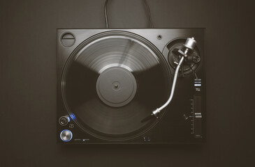 Flat lay image of dj turntable on black background. Overhead photo of professional disc jockey...