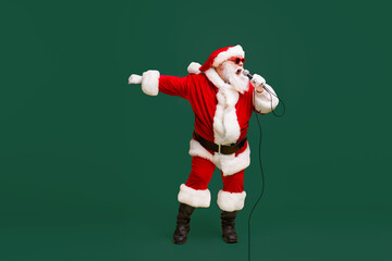 Full body photo of crazy santa claus sing microphone song on christmas x-mas newyear disco wear...