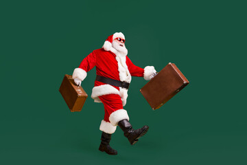 Full length profile side photo of white grey hair bearded santa claus hold suitcase go copyspace...
