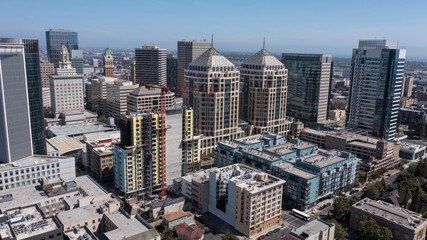 Afternoon skyline aerial view of the urban core of downtown Oakland, California, USA.