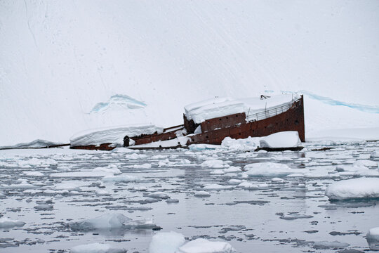 A sunken metal whaling boat, Gouvernoren, is trapped in the Ice of Antarctica Enterprise Island. 