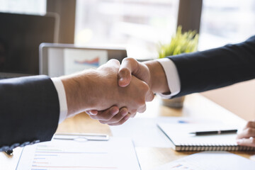 Support, business people, happy asian young man in suit, making handshake, shake hand together with partnership, customer or colleague after is done, successful. Worker meeting, congrats merger.
