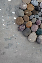Fototapeta na wymiar Stones in light and shadow mandala circle. 