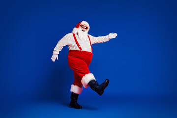 Fototapeta na wymiar Full length body size view of his he attractive cheerful cheery funny fat white-haired Santa going wearing festal look isolated bright vivid shine vibrant red burgundy maroon color background