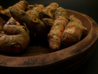 Turmeric on wooden plate