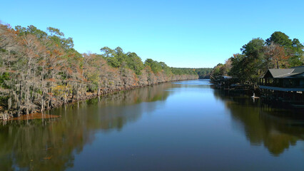 Low flight over Big Cypress Bayou River in Texas - aerial view