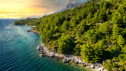 Obraz premium Croatia. Aerial view on beach and people. Vacation and relax. Beach and blue water. Top view from drone at beach and azure sea. Travel and holiday