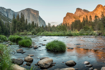 sunset lights in Yosemite Valley - El Capitan, Cathedral Rocks, Bridalveil Falls - at the Merced...
