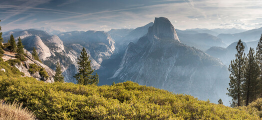 view from Washburn Point with Half Dome, 
North Dome, Basket Dome, Mt Watkins, Tenaya Peak, Echo Peak, Yosemite National Park, California, US