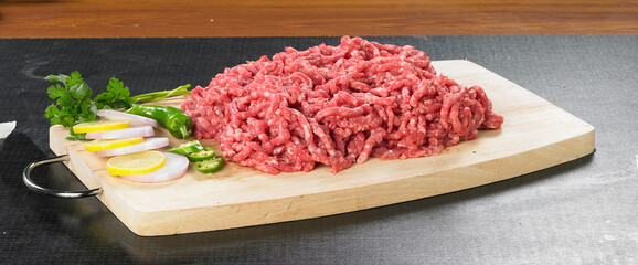 Raw Minced beef on a cutting board.