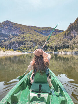 Woman kayaking in Ard&egrave;che in France.