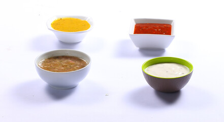 Bowl with sauce set isolated on white background