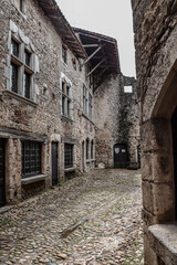 Fototapeta na wymiar Old buildings in the medieval village Pérouges in France.