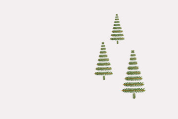 Simple New year greeting card made of fir twigs.
