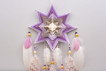 Esoteric woven mandala magical dreamcatcher  on grey background