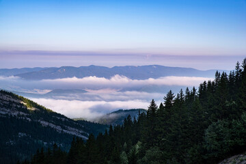 Mountain landscape in summer with clouds and rocks
