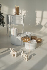 the shadow of the sun from the word xmas. stylish New Year's gifts for the Christmas holidays
