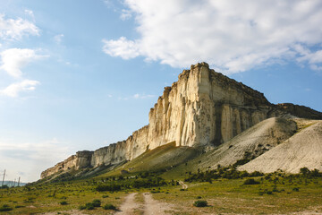 Fototapeta na wymiar White Rock, Crimea. Rock formation - Mount White Rock, view from below against the blue sky