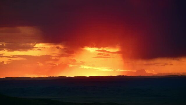Timelapse video of dramatic sky, sun and clouds. Gobi region, Mongolia