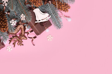 Pine trees branches with Cristmas New Year decoration top view, flat lay on pink background with...