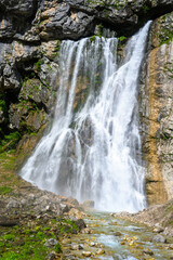 The waterfall in the tropical mountains.