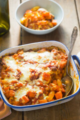 Gnocchi, pumpkin, chickpeas bale in tomato sauce with cheese 