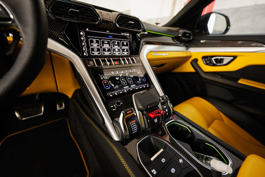 Ternopil, Ukraine- November 11, 2022:  Car gear box of yellow Lamborghini Urus.