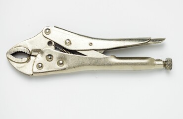 Stainless steel vice grip plier isolated in white background