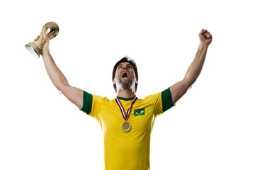 Brazilian soccer player, celebrating the championship with a trophy in his hand