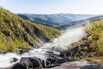 Fototapeta na wymiar Beautiful waterfall Hivjufossen in Norway on a beautiful summer day