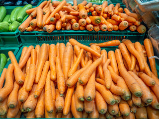 Store shelves. Carrot counter. To the grocery store for lunch. Assortment in the supermarket.