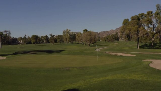 An aerial view of a golf corse in the American south west.