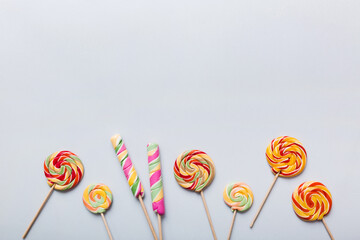 Set of colorful lollipops on colored background. Summer concept. Party Happy Birthday or Minimalist Concept