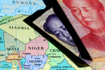 Chinese banknotes and a map of Africa
