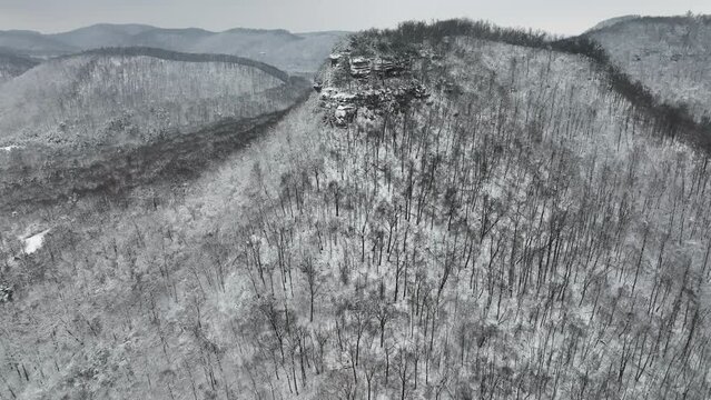 drone view over snow covered mountains