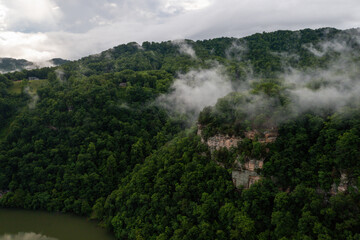 Fototapeta na wymiar Foggy and Misty Cliffs + Forested Mountains - Hawks Nest State Park - West Virginia
