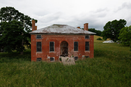Abandoned Georgian Revival House - Historic Brick Building with Four Chimneys and Standing Seam Tin Roof - Sweet Springs, West Virginia
