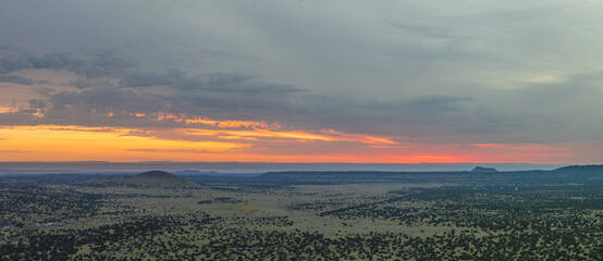 Sunrise over the San Francisco Volcano field in Arizona on a cloudy morning from an elevate...