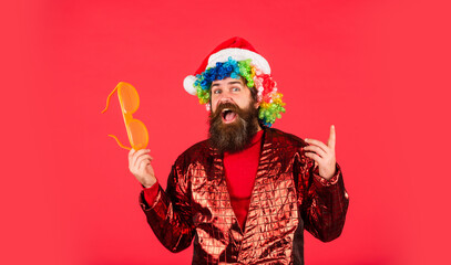 Disco music. Warmest greetings this season. Bearded man celebrate christmas. Christmas party entertainment. Christmas spirit. Cheerful guy colorful hairstyle. Funny man with beard. Winter holidays