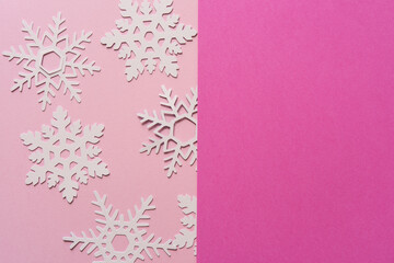 pink paper snowflakes with blank pink paper