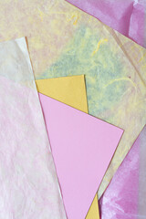 pink and yellow paper with tissue paper