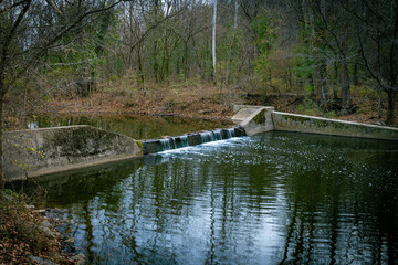Fototapeta na wymiar Small waterfall on a stream in rural Kentucky