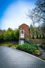 Small guards shelter cover house on the grounds of bourbon distillery near Frankfort, Kentucky