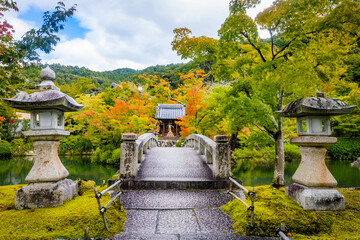 Beautiful stone bridge in Eikando Temple pond at fall