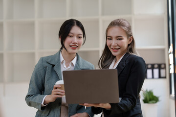 Female office worker business suit working together with friends in office, successful and agreement concept